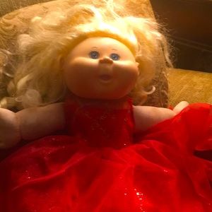 Sweet cabbage patch girl with red tutu and beautiful blond hair